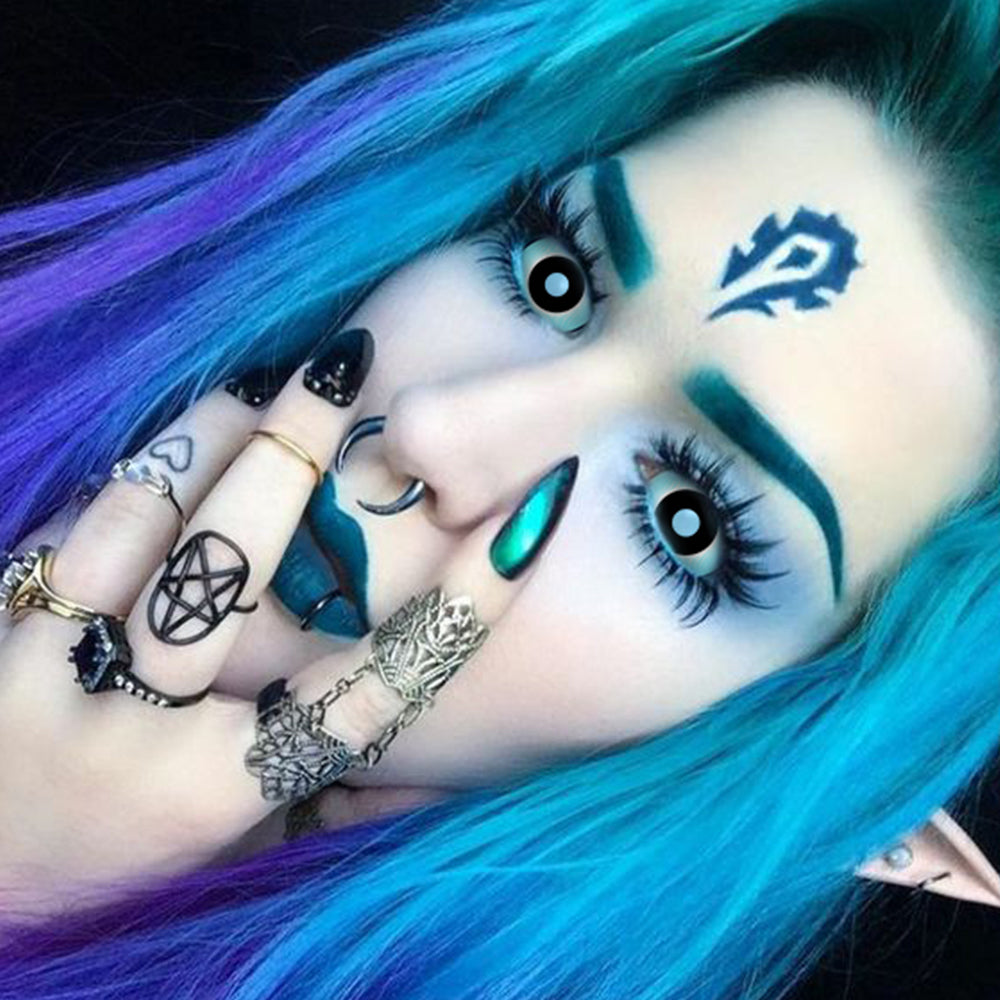 Model are wearing Black And Blue Sclera Lenses