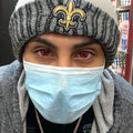 A Model Wearing Sasuke 3 Tomoe Sharingan Eye Contacts (Prescription) - PsEYEche